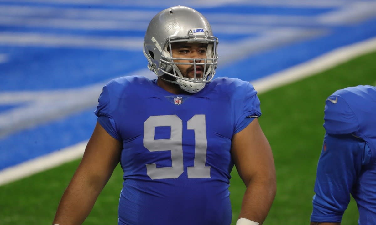 Penisini warms up before Week 12 game against the Houston Texans. 